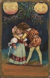 Christmas Greetings - little boy kisses little girl (under mistletoe?) Postcard