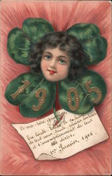 1905 - Young woman's head in center of four green leaves Postcard