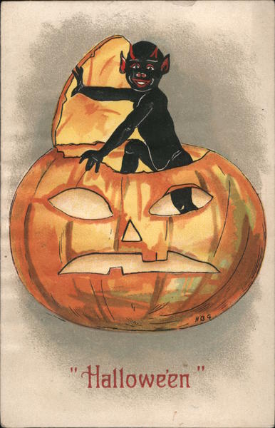 Hallowe'en - Black Goblin climbing out of jack-o-lantern