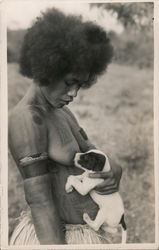 African Woman Breast Feeding Puppy Postcard