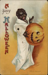 Rare Mechanical Black child in ghost costume, holding orange jack-o-lantern head. Postcard