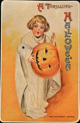 Girl in ghost costume holding a jack-o-lantern (Reproduction) Postcard