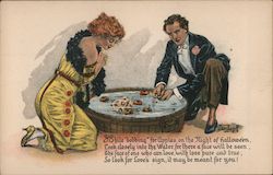 Old Fashioned Man and Woman Bobbing for Apples Halloween Postcard Postcard Postcard