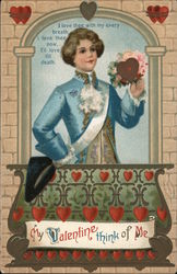 Boy holding heart and flowers standing on a balcony Postcard