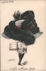 A woman wearing a large hat wrapped in black feathers,carrying a hat box Postcard