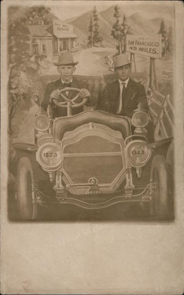 Two Men in Car in Front of To San Francisco 45 Miles Back Drop 1908 California