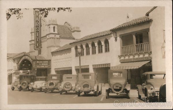 Varsity Theater and Columbia Outfitting Co. With Cars Parked in Front Palo Alto California