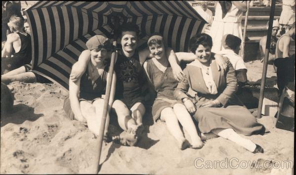Neptune Beach Four Women Sitting Under Umbrella on a Beach Alameda California