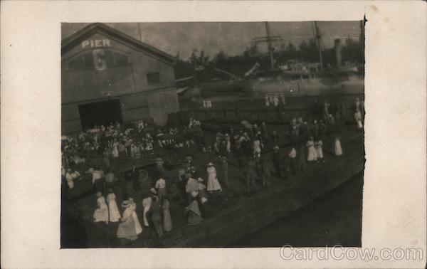 A Crowd of People Standing in Front of Pier 6 Oakland California