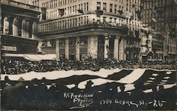 People Holding Huge American Flag in Street Postcard