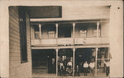 Men Gathered on Porch of a Business Coca-Cola Signs Postcard