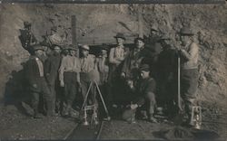 A Group of Men Standing Outside a Mine Postcard