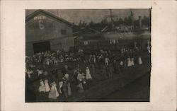 A Crowd of People Standing in Front of Pier 6 Postcard