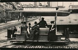 People Sitting on a Cable Car Postcard