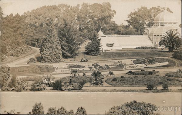 Conservatory of Flowers in Golden Gate Park with Flower Beds in Foreground San Francisco California