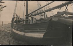 Boat Docked on Land Postcard