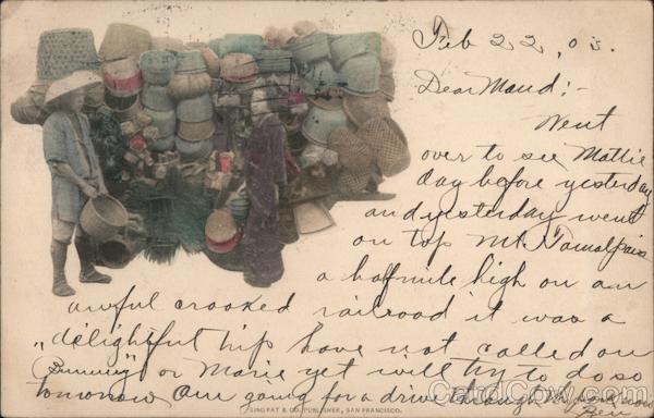 A Man and a Woman Standing Next to a Pile of Baskets Chinatown San Francisco California