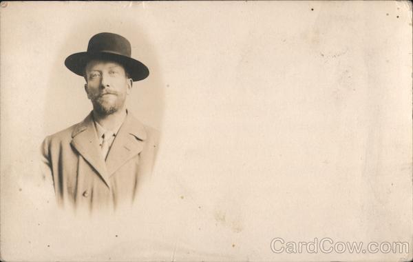 A Man in a Coat and Hat San Francisco California