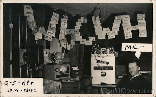 A Man Sitting in a Room with Radio Equipment W6CWH San Francisco California