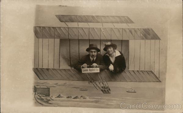 A Man and Woman Laying on a Fake Airplane San Francisco California