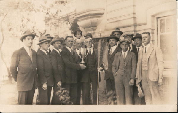A Group of Men Holding a Large Silver Cup San Francisco California