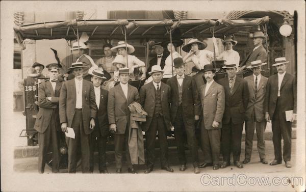 A Large Group of People In a Cable Car and Standing in Front of a Cable Car San Francisco California