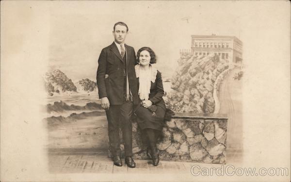 A Man and a Woman Posing on a Rock Wall San Francisco California