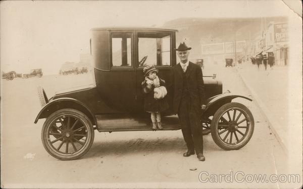 A Man and a Little Girl Next to a Car San Francisco California