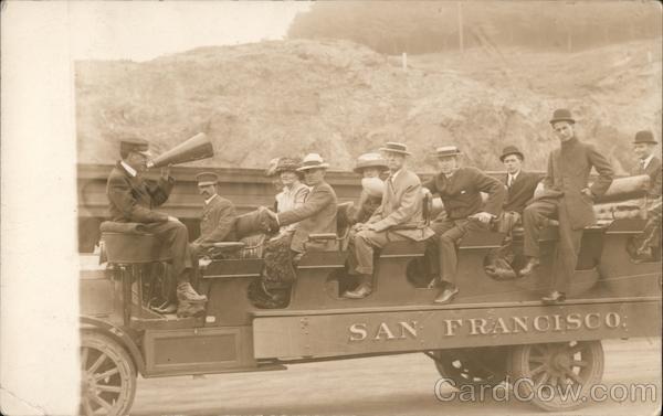 Several Men and Women in a Large Open Air Car San Francisco California