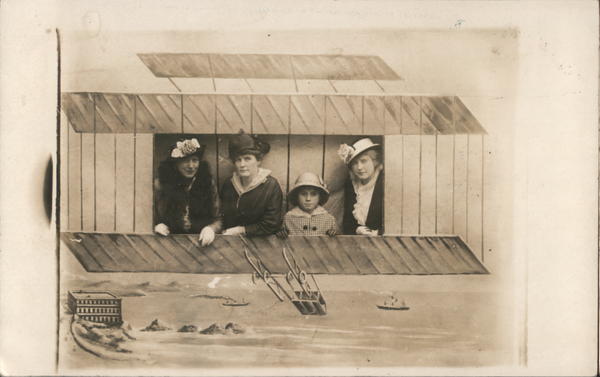 Three Women and a Girl Posing on a Fake Glider San Francisco California
