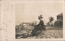 A Woman Sitting in the Dirt San Francisco, CA Postcard Postcard Postcard