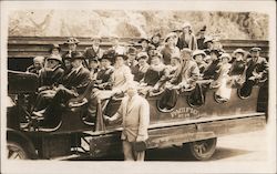 Several Men and Women in a Large Open Air Car Postcard