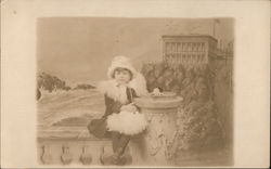 A Young Girl Sitting on a Wall Postcard