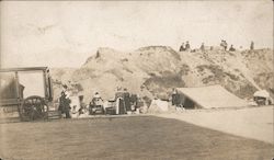 A Group of People Gathered Outdoors Earthquake Postcard