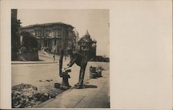A Man Cooking on the street Earthquake Postcard