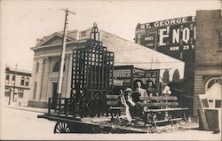 Two Men and a Young Boy Sitting In Front of a Store Earthquake Postcard