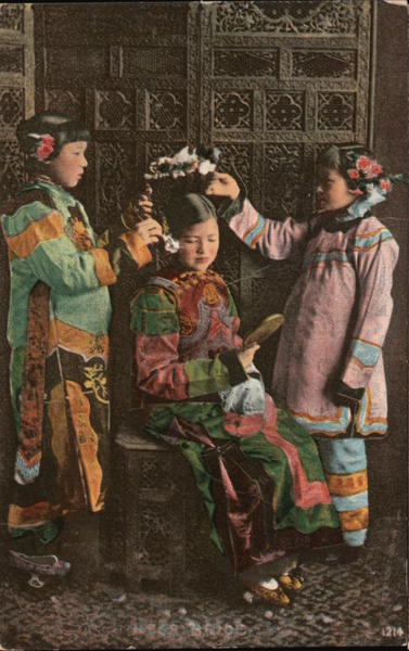 Two Girls Placing Flowers on Another Girl's Head Chinatown