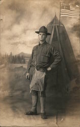 Uniformed Soldier in front of American Flag Postcard