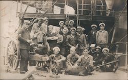 A group of sailors and a goat USS California Postcard