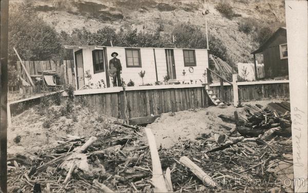 Man Standing by Destroyed House Pajaro River at Ocean Watsonville California