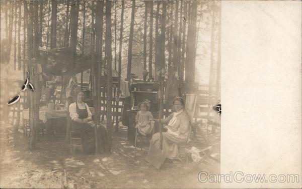 Two Women and a Girl Sitting in a Wooded Area Pacific Grove California