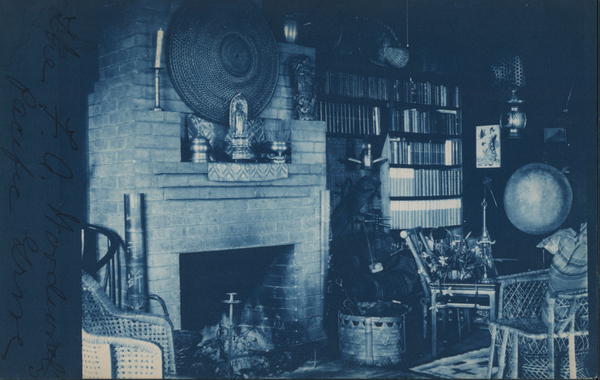 A Fireplace Next to A Large Shelf of Books Pacific Grove California