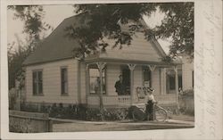 Two People at a House on College Ave. Postcard