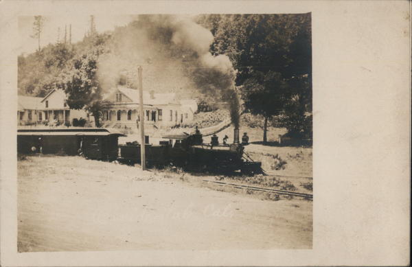 Train on track going through town. Occidental California