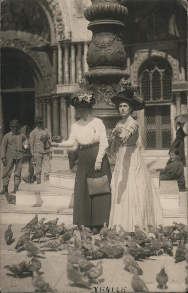 Two Women in Big Hats Feeding Pigeons Venice Italy