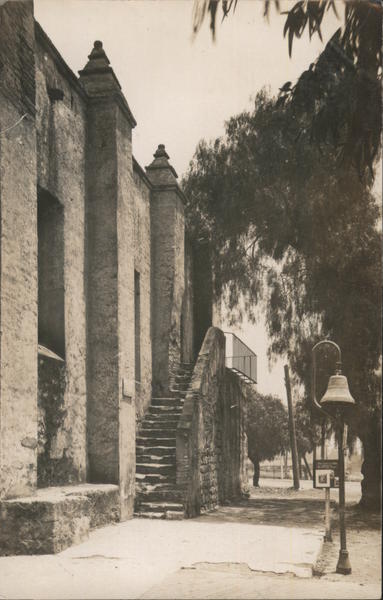 A Large Stone Building and a Sidewalk San Mateo California