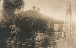 Cabin with US Flag Postcard