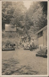 Cosmo Farms - Group of people posed on hillside steps Postcard