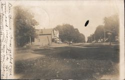 A Street with a Horse Drawn Carriage Postcard