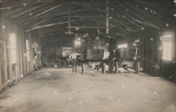Two Old Touring Cars in Garage Postcard